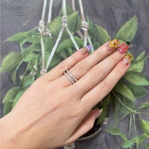 925 Sterling Silver ring wrap with Moissanite Diamonds.